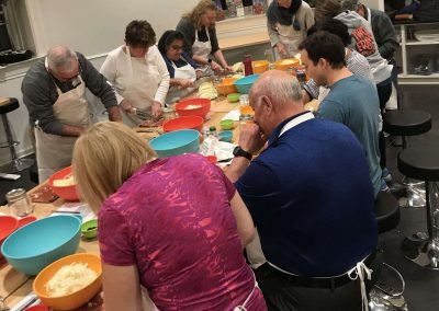 Participants Learning to Prepare Vegetable Ferments during a Hands-on Workshop