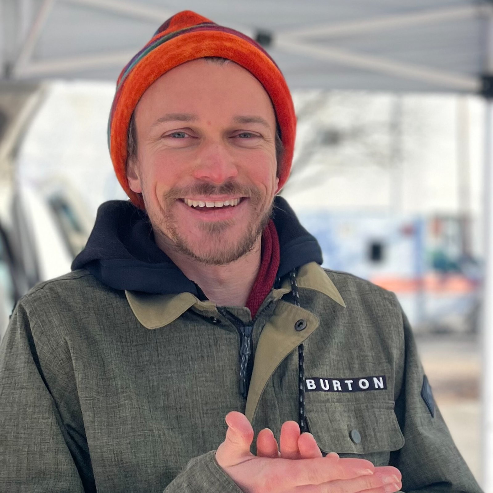 Trevor Ring of Community Cultures bundled up for a cold day at the market